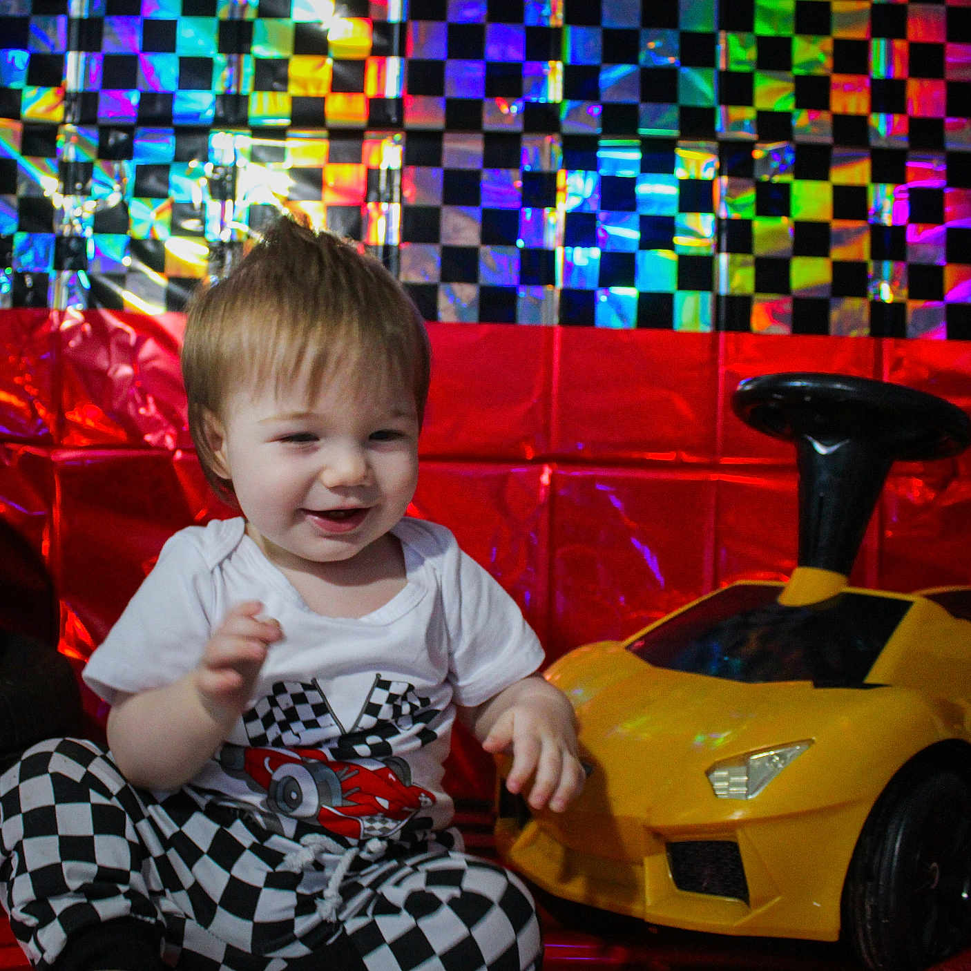 Asher joined the competition — help win amazing prizes! alloywheel, baby, bodypart, car, carwheel, couch, face, finger, furniture, hand, head, machine, person, photography, portrait, spoke, tire, transportation, vehicle, wheel