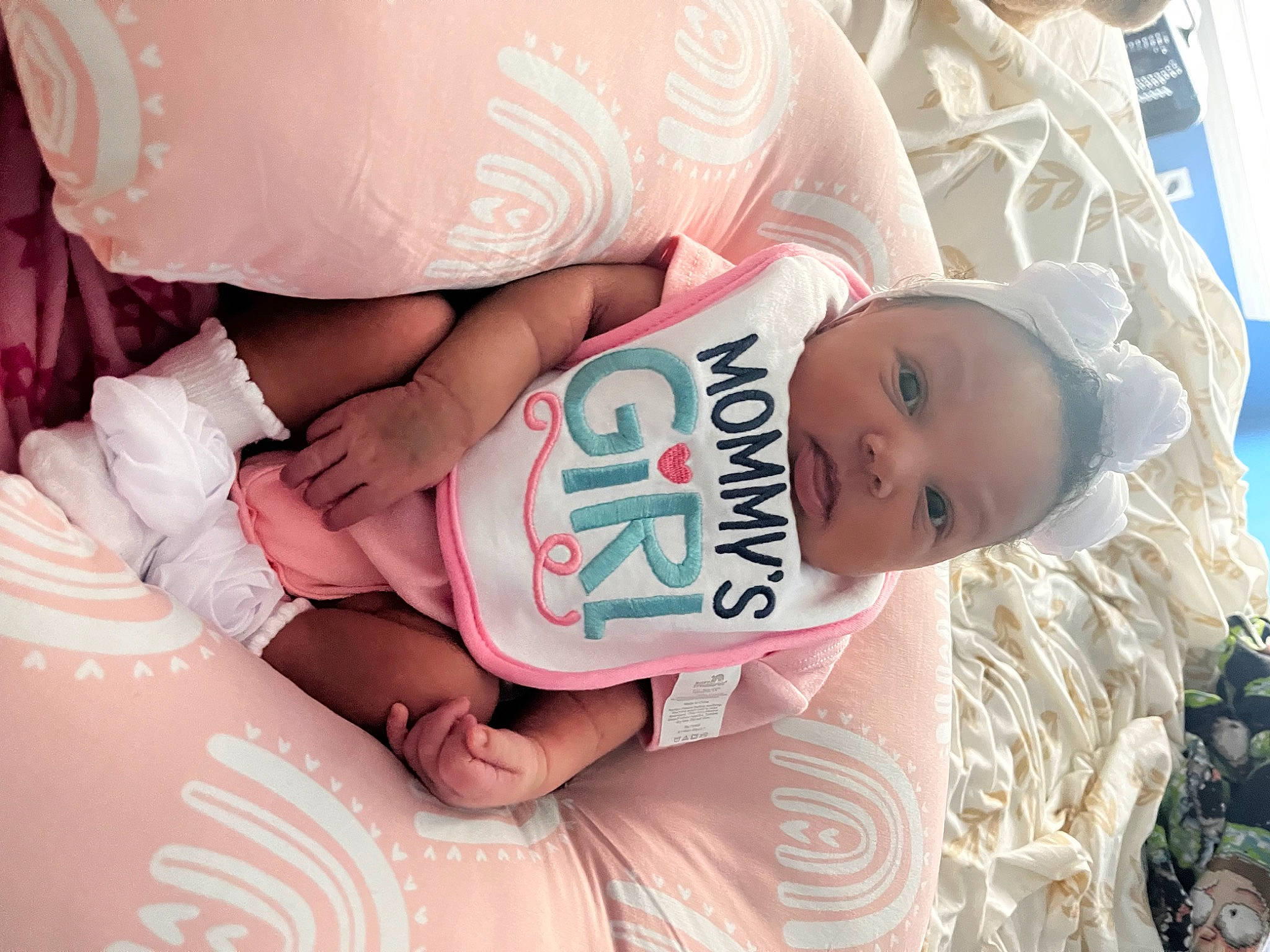 Malani joined the competition — help win amazing prizes! arm, baby, baby_toddler_clothing, child, comfort, event, finger, hand, happy, hat, human_body, nail, pattern, people, person, pink, product, skin, textile, thigh