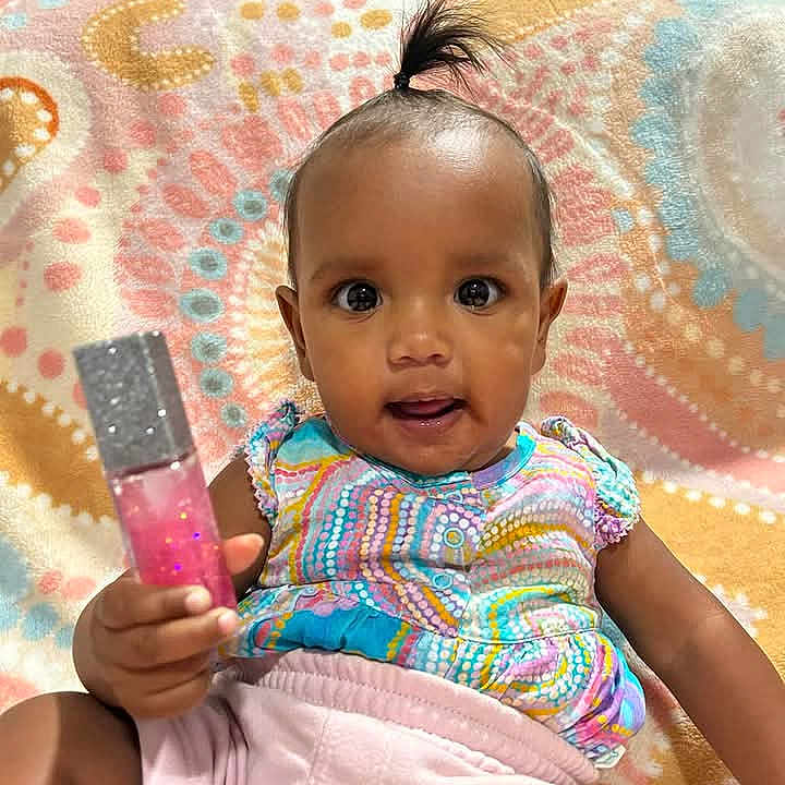 Ky'Lani Marie joined the competition — help win amazing prizes! baby, babylaughing, clothing, cream, dessert, face, food, hair, happy, head, person, racket, sitting, sleeve, smile, smokepipe, sport, tennis, testtube, text