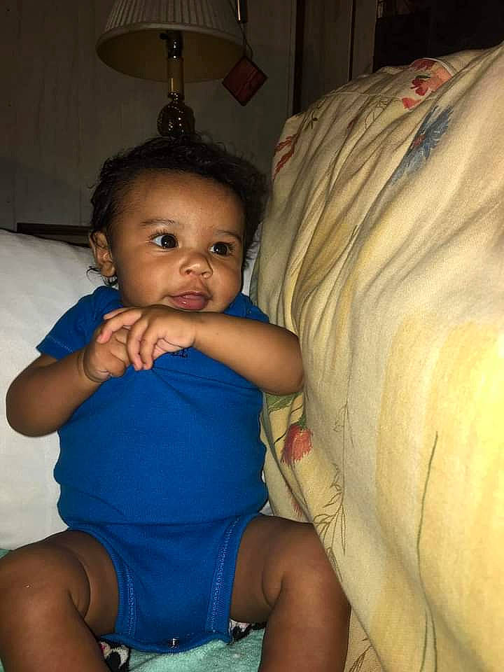 Jasper is registered to the contest to win money with this photo: abdomen, arm, baby, cheek, chest, comfort, elbow, eye, finger, happy, human_leg, iris, joint, lamp, leg, muscle, person, skin, thigh, thumb