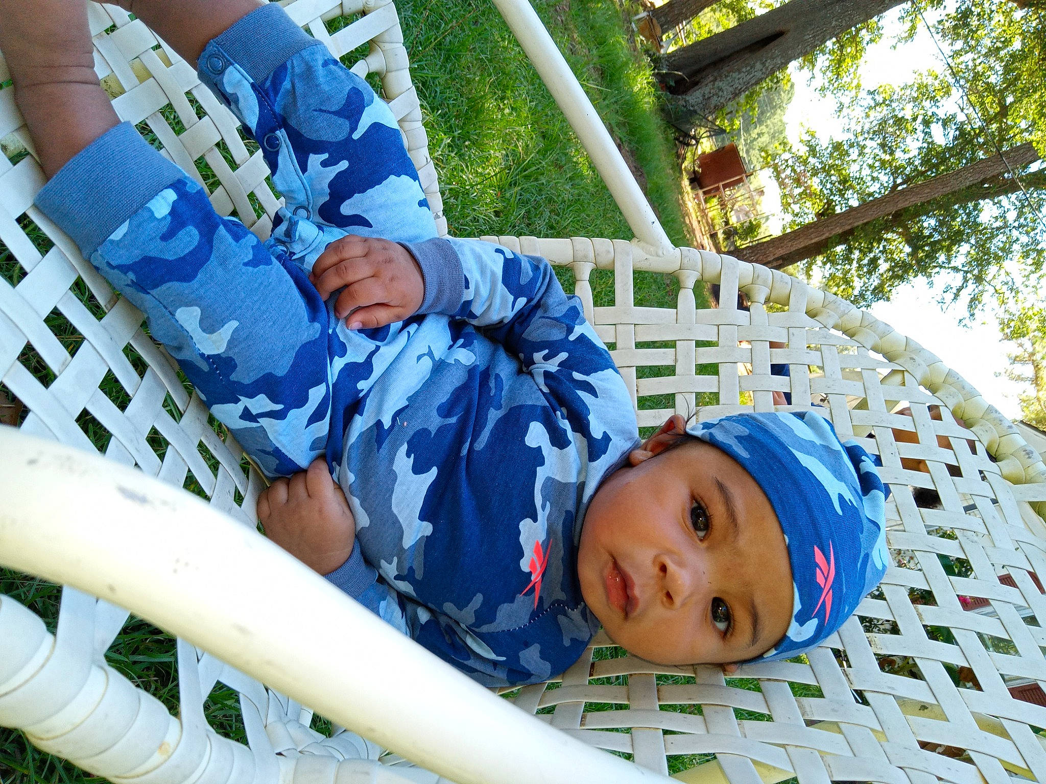 Jasper joined the competition — help win amazing prizes! azure, baby, baby_products, child, comfort, electric_blue, fun, grass, hat, headwear, leisure, outdoor_play_equipment, pattern, person, plant, product, recreation, shorts, sitting, toddler