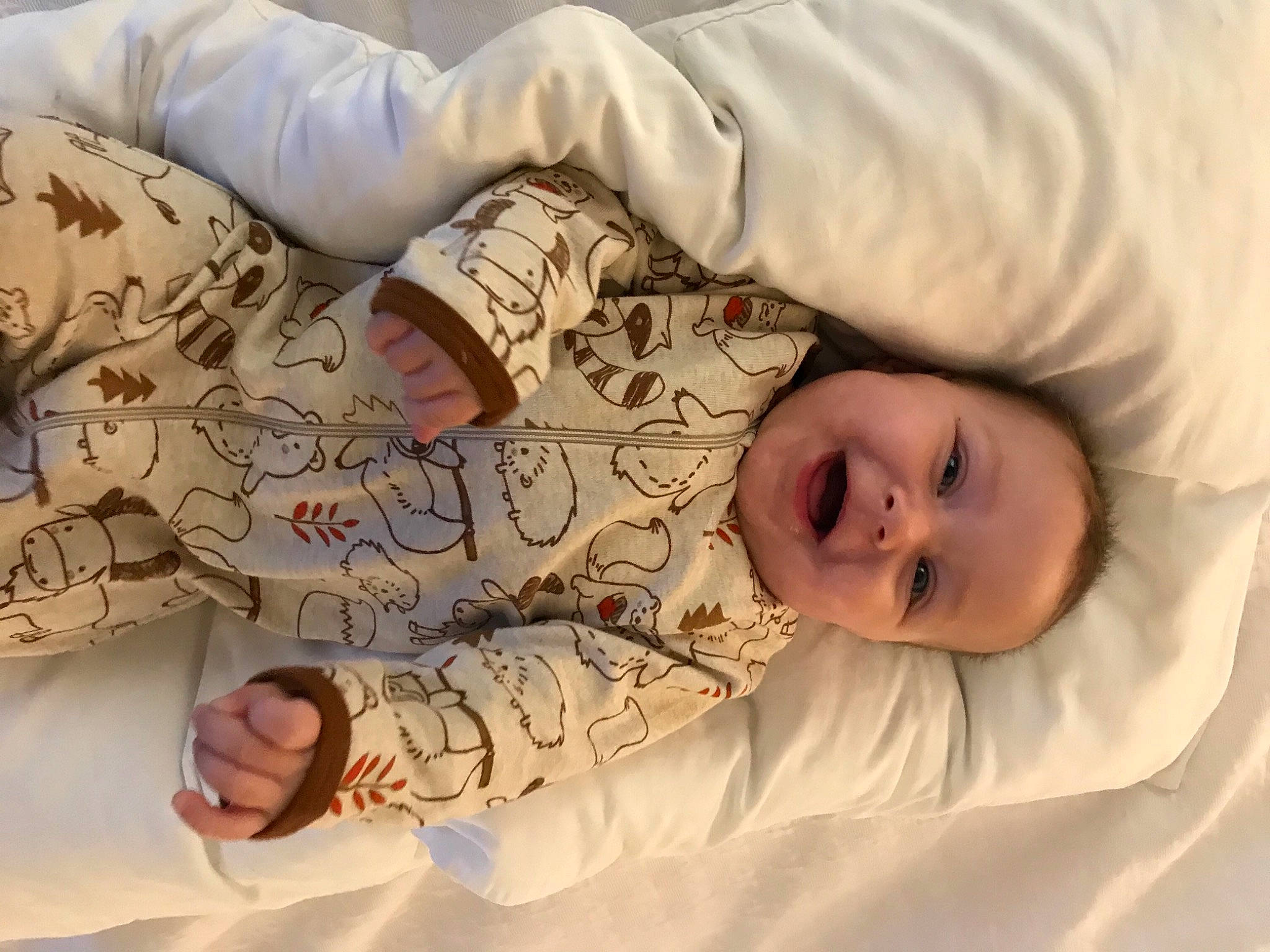 Stella is registered to the contest to win money with this photo: baby, baby_toddler_clothing, child, comfort, facial_expression, finger, gesture, hand, human_body, joint, mammal, mouth, nose, person, product, skin, sleeve, smile, textile, toddler