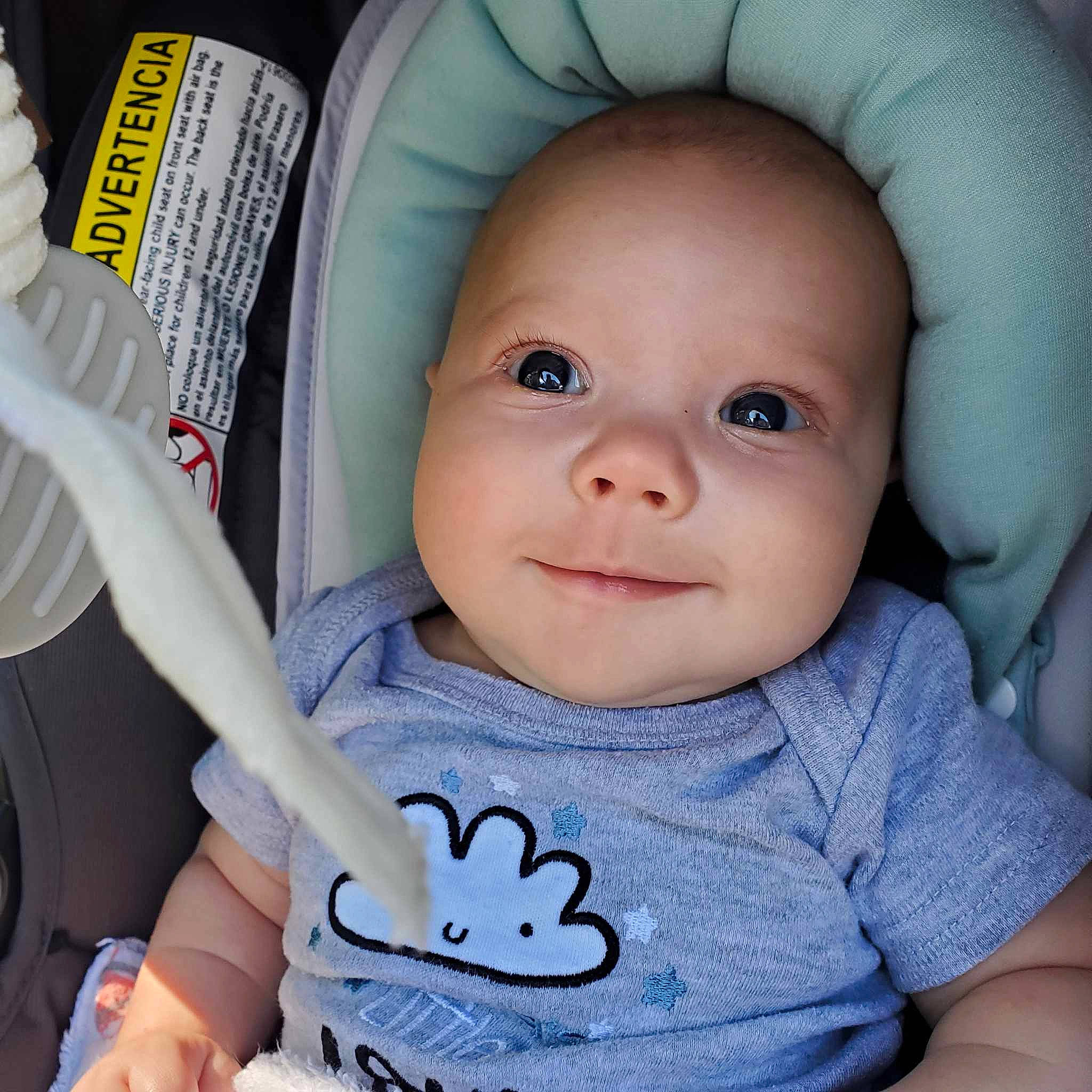 Dustin is registered to the contest to win money with this photo: baby, baby_toddler_clothing, cheek, chin, cool, eye, eyebrow, eyelash, finger, gesture, hand, iris, mouth, nose, person, product, skin, sleeve, smile, textile