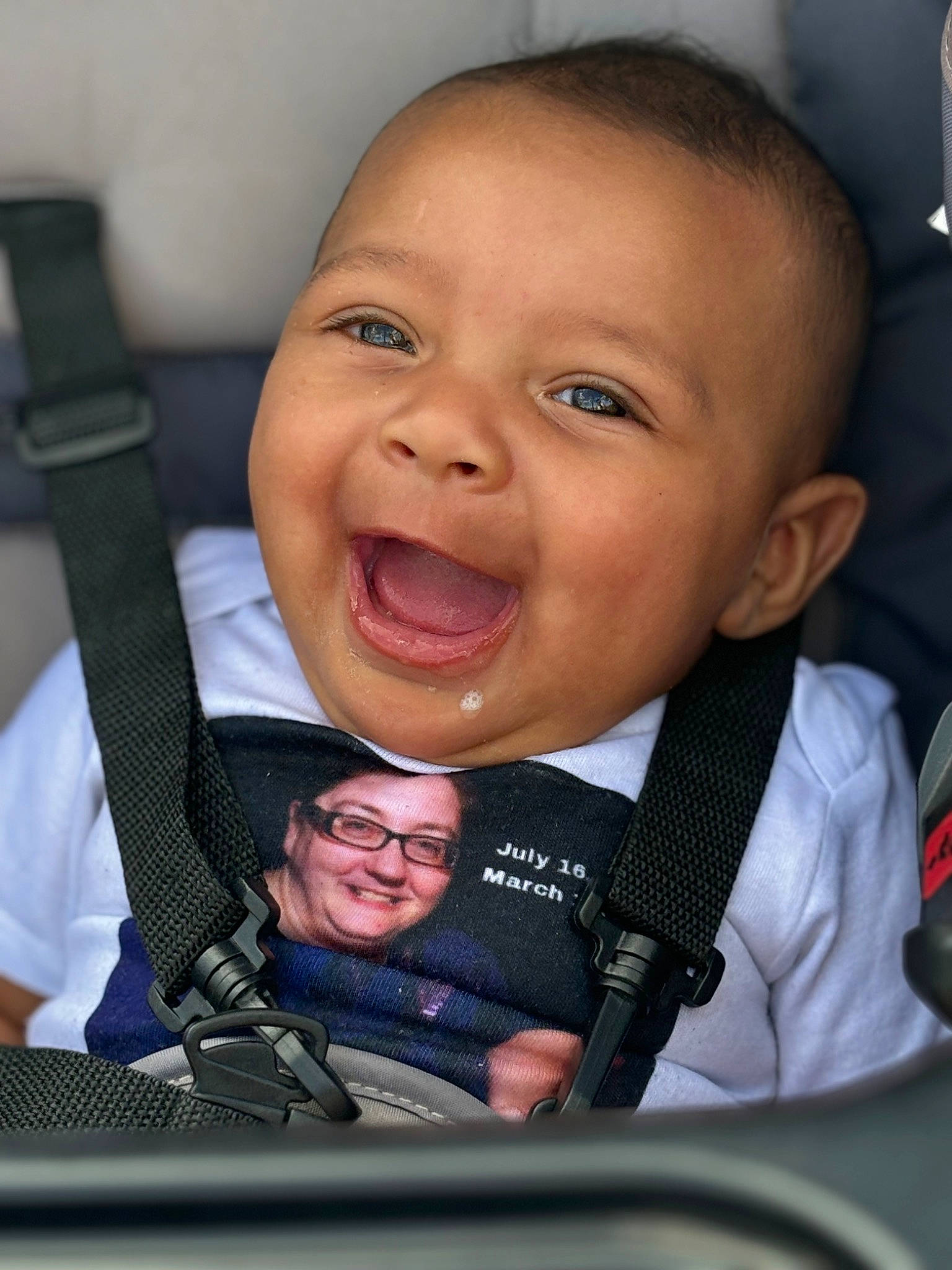 Raelynn joined the competition — help win amazing prizes! baby, cheek, child, facial_expression, finger, fun, gesture, happy, headwear, iris, joy, motor_vehicle, nose, organ, person, product, seat_belt, skin, smile, thumb