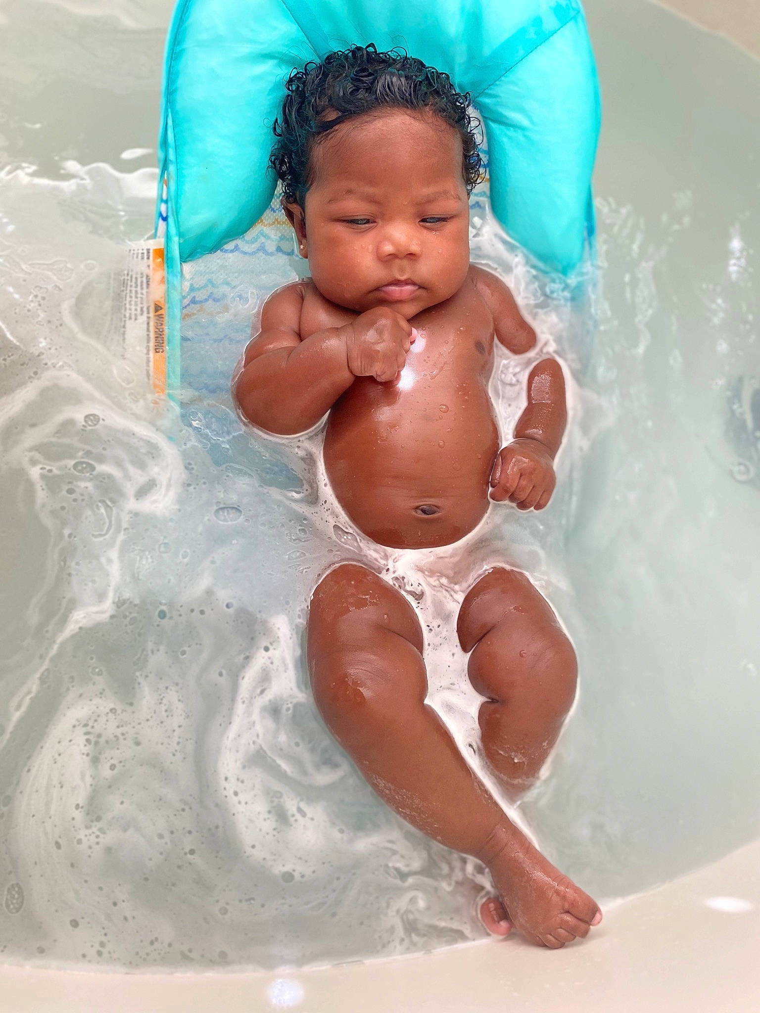Legacy is registered to the contest to win money with this photo: baby, baby_bathing, barechested, barefoot, bathing, blue, chest, fluid, fun, happy, head, human_body, leisure, person, recreation, skin, swimming_pool, thigh, toddler, trunk