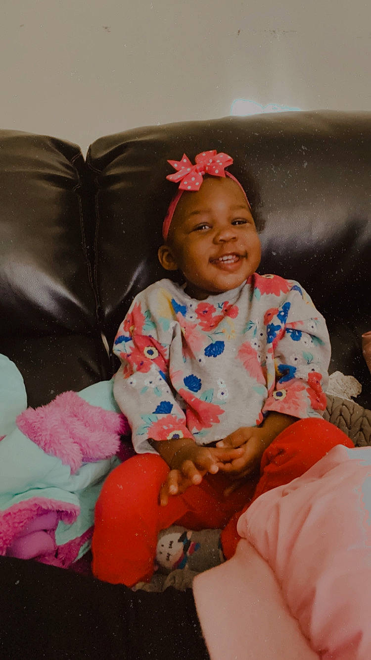 Rhyan joined the competition — help win amazing prizes! baby, child, headwear, joy, person, pink, play, sitting, smile, toddler