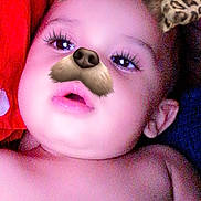 Logan joined the competition — help win amazing prizes! baby, background, child, closeup, cute, digital_filter, dog_filter, expression, eyes, face_filter, indoor, infant, leopard_ears, mouth, playful, polka_dot, portrait, red, skin, snout