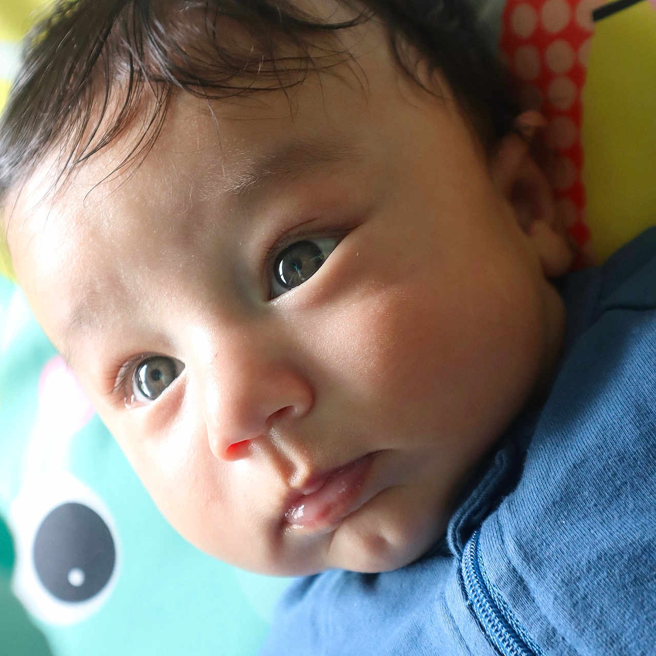 Kameron is registered to the contest to win money with this photo: accessories, baby, bodypart, ear, earring, face, finger, frown, hand, happy, head, jewelry, mouth, newborn, person, photography, portrait, sad, selfie, smile