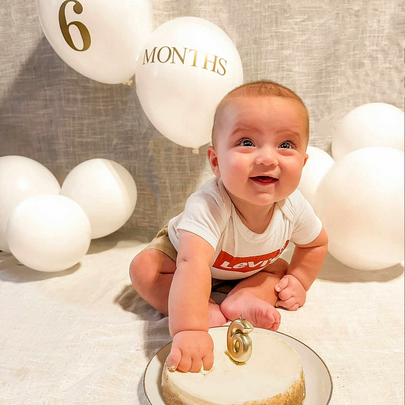 Colter is registered to the contest to win money with this photo: baby, babylaughing, balloon, cheesecake, cream, dessert, egg, face, food, fun, happy, head, icing, party, people, person, photography, portrait, sitting, text