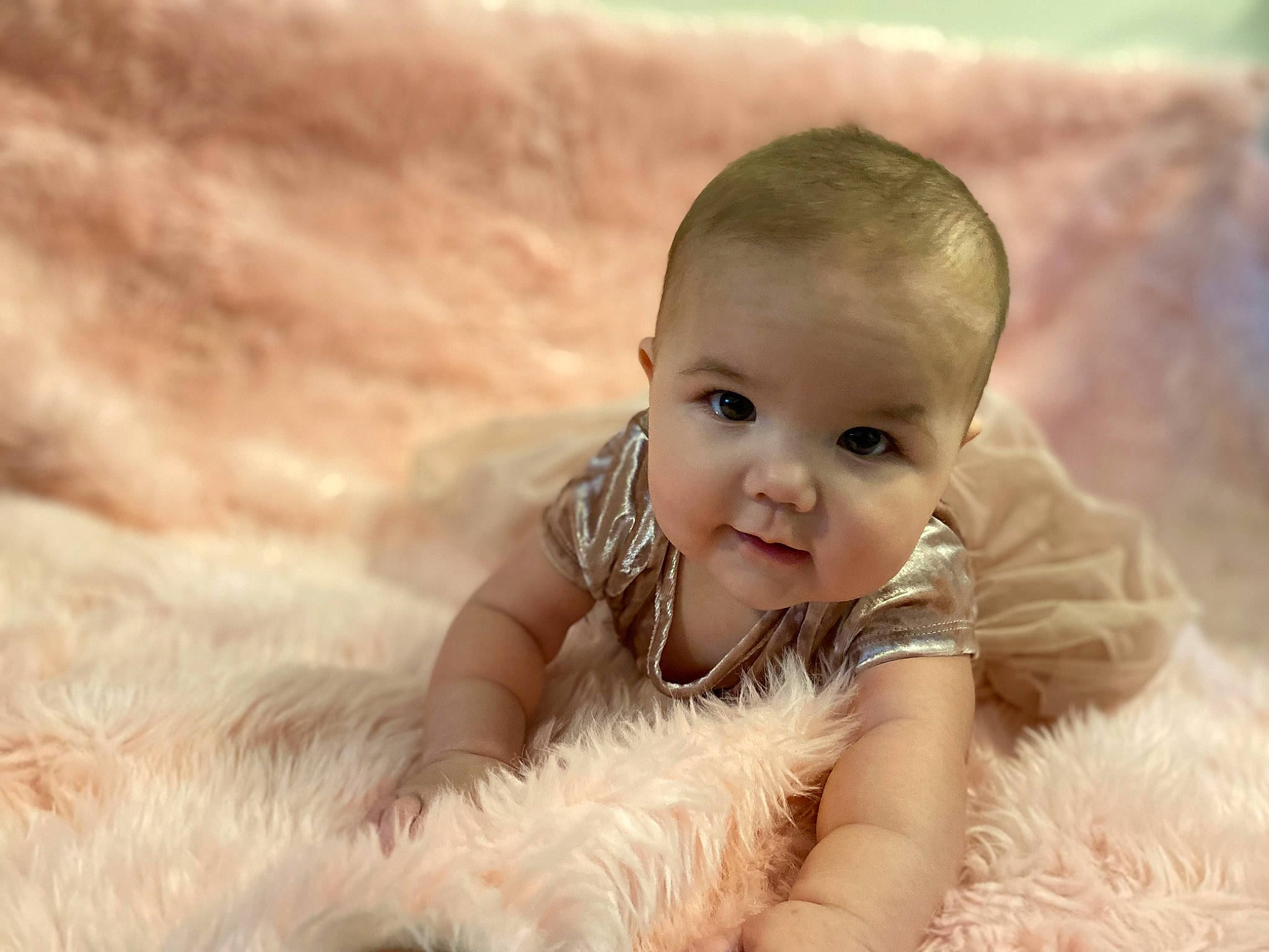 Elliana is registered to the contest to win money with this photo: baby, baby_toddler_clothing, child, flash_photography, fun, fur, grass, grassland, happy, iris, laugh, people_in_nature, person, portrait, portrait_photography, sitting, skin, smile, toddler, wood