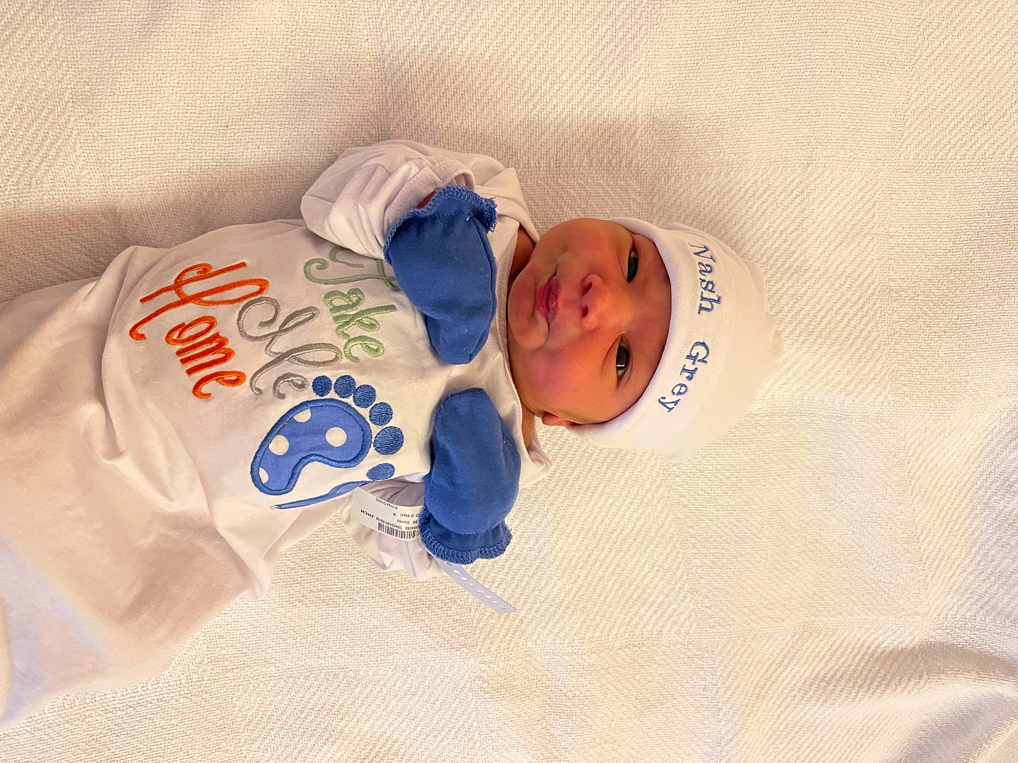 Nash is registered to the contest to win money with this photo: baby, baby_products, baby_safety, baby_sleeping, baby_toddler_clothing, bedtime, child, comfort, hat, headwear, linens, nap, pattern, person, room, sleep, sleeve, toddler