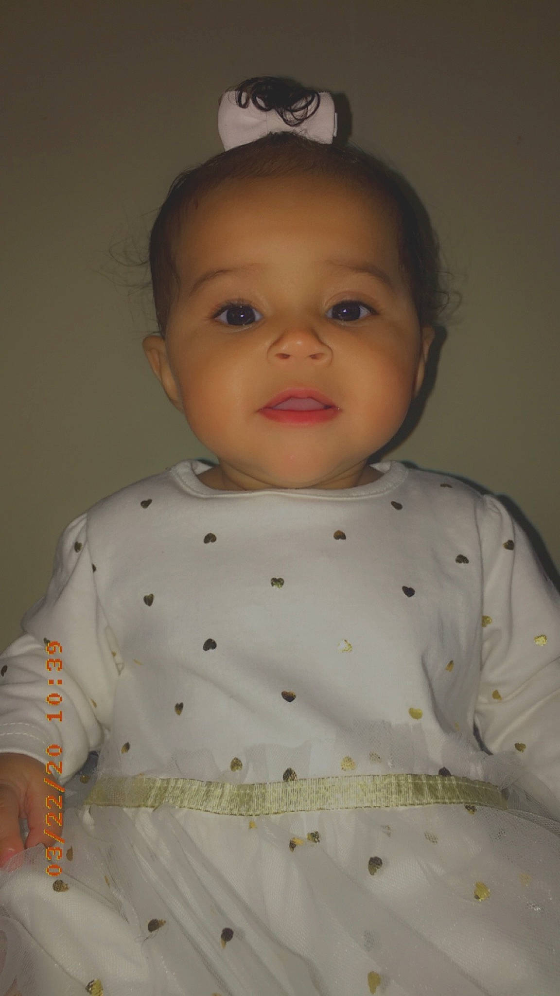 Phoebe is registered to the contest to win money with this photo: baby, cheek, child, forehead, head, iris, person, skin, smile, standing, toddler