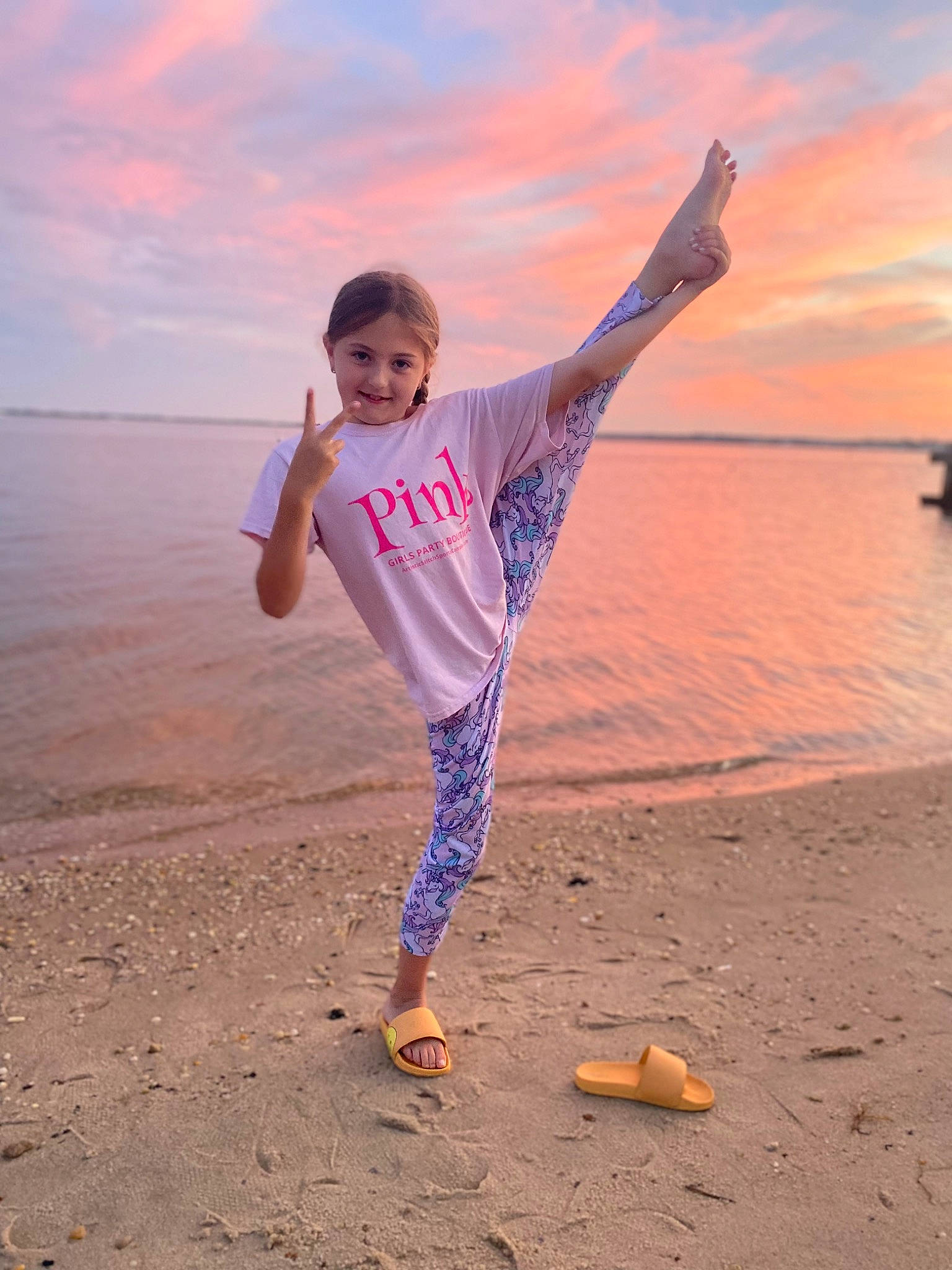 Fiona joined the competition — help win amazing prizes! beach, body_of_water, cloud, flash_photography, fun, gesture, happy, horizon, joy, landscape, leisure, people_in_nature, people_on_beach, person, sand, sky, sleeve, summer, sunlight, t_shirt