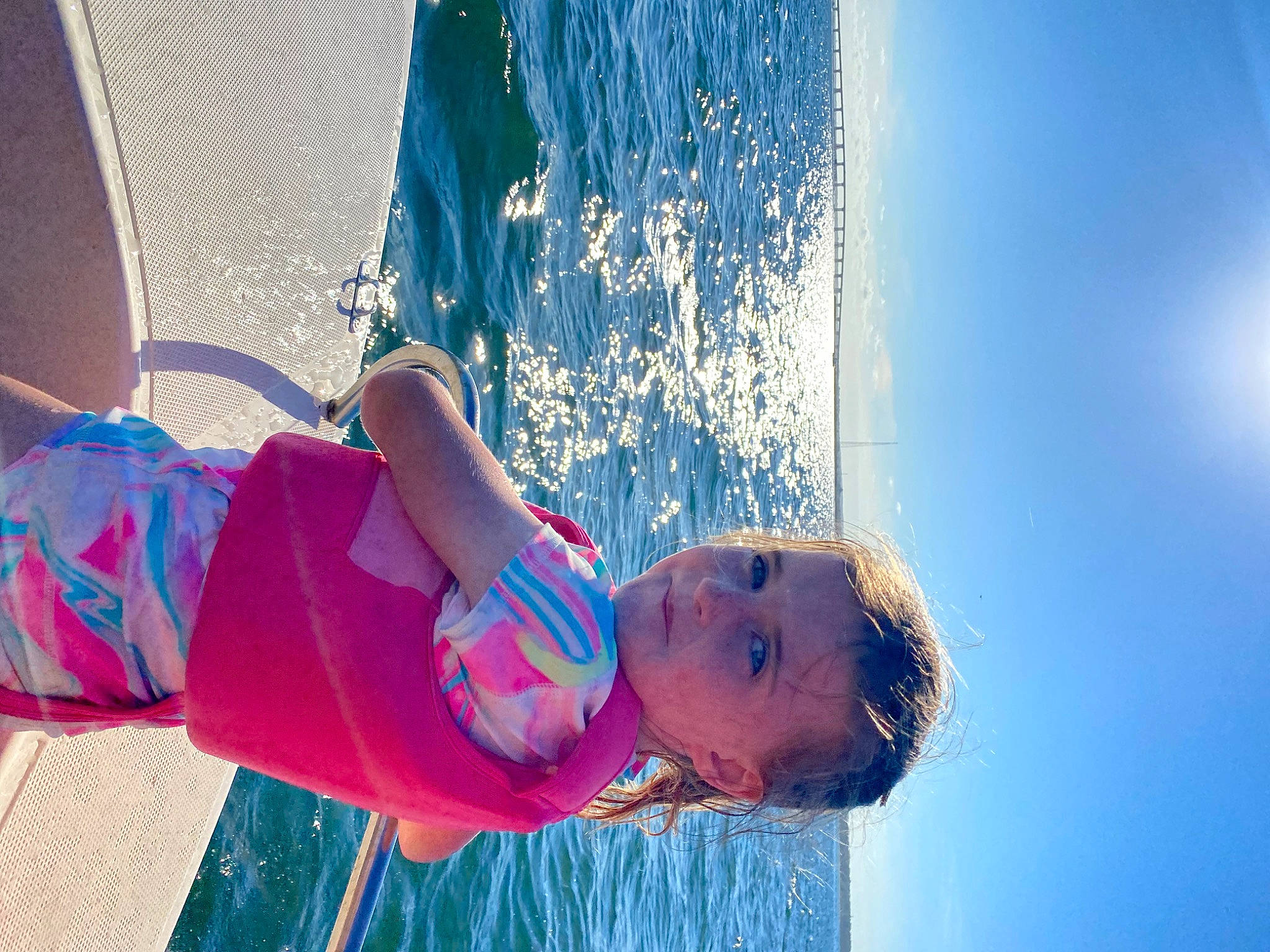 Maeve is registered to the contest to win money with this photo: arm, azure, baby, beach, child, cloud, elbow, electric_blue, eye, fun, happy, human_body, leisure, ocean, people_in_nature, person, recreation, sky, toddler, tree