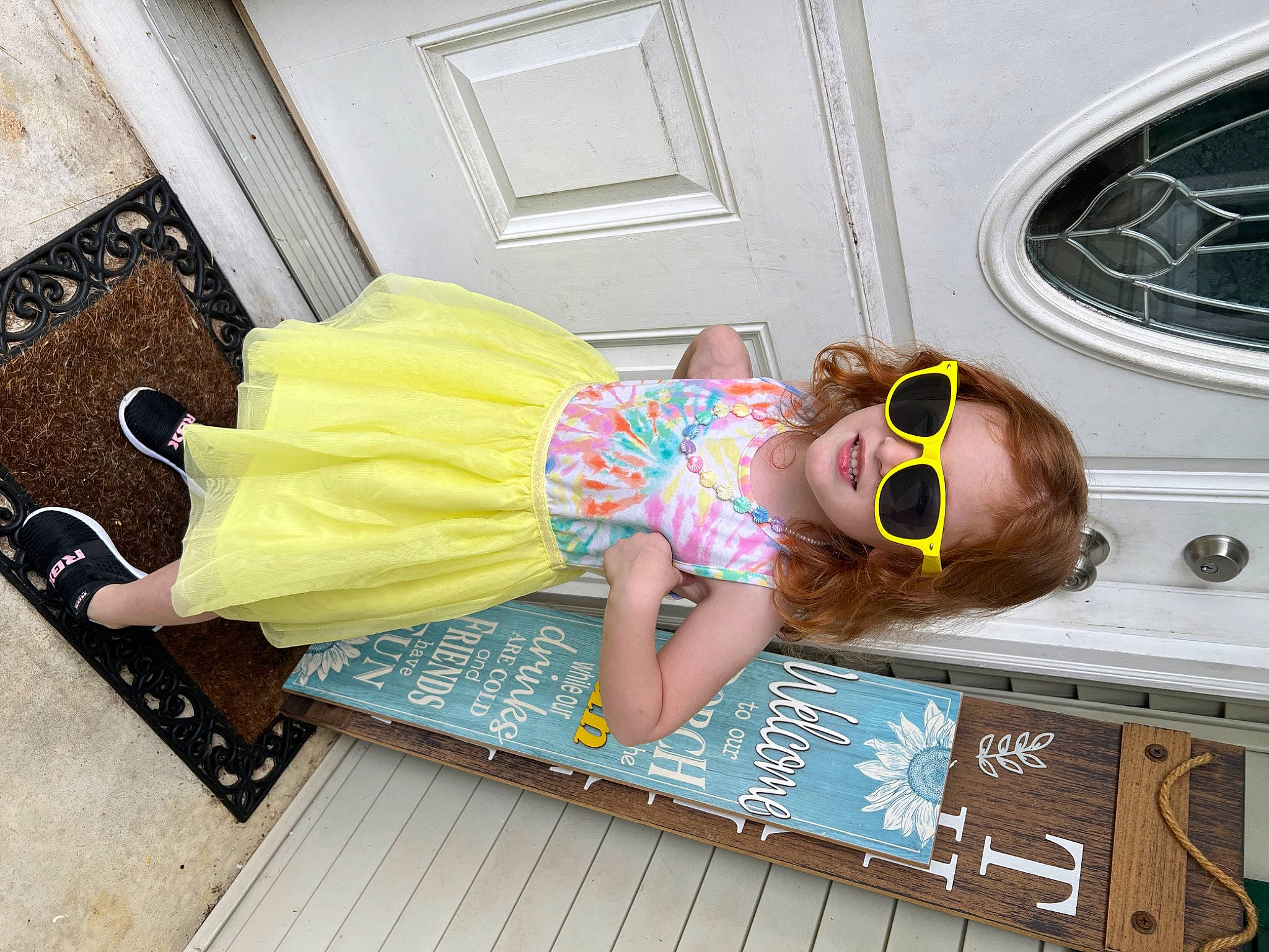 Adelynn joined the competition — help win amazing prizes! child, circle, door, eyewear, flooring, fun, goggles, happy, hat, human_leg, leisure, pattern, person, room, sandal, smile, sunglasses, t_shirt, thigh, toddler