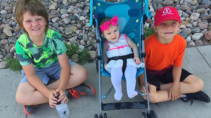 Tavon joined the competition — help win amazing prizes! baby, baby_carriage, baby_toddler_clothing, cap, clothing, fun, grass, green, happy, hat, headwear, joy, leg, leisure, person, public_space, shoe, shorts, smile, sneakers