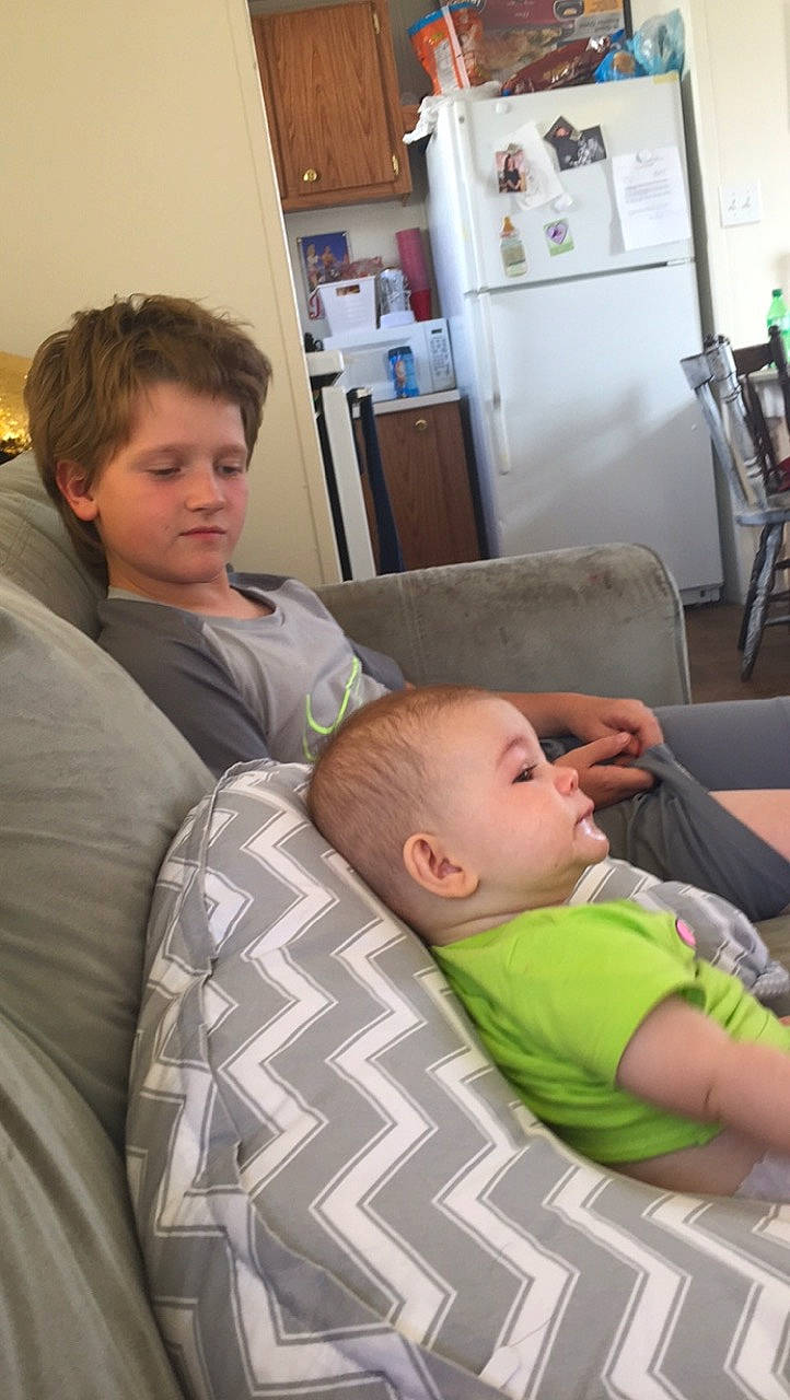 Paxton joined the competition — help win amazing prizes! arm, baby, baby_products, chair, child, comfort, couch, event, flooring, fun, joint, pattern, person, picture_frame, refrigerator, room, shelf, sitting, t_shirt, toddler