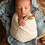 Alessio a rejoint le concours — aidez-le/la à gagner de superbes lots ! newborn, baby, sleeping, wrapped, blanket, knitted, blue, cream, flower, hand, cozy, portrait, infant, peaceful, soft, texture, wooden, resting, cute, closeup