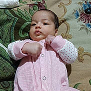 Aurelia joined the competition — help win amazing prizes! baby, child, cute, dark_hair, expression, face, fists, floor, hands, head, indoors, infant, lying_down, onesie, patterned_rug, pink_clothing, polka_dots, rug, skin, small