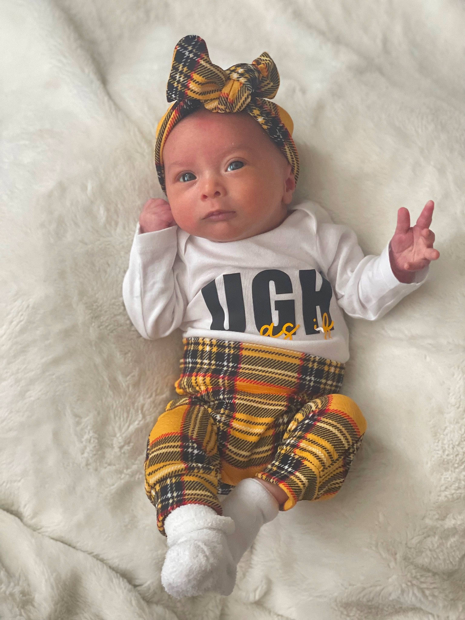 Gracey joined the competition — help win amazing prizes! baby, baby_toddler_clothing, cap, cheek, child, costume_hat, eye, fashion_accessory, fur, happy, headgear, headwear, pattern, person, sitting, sleeve, sock, t_shirt, textile, toddler