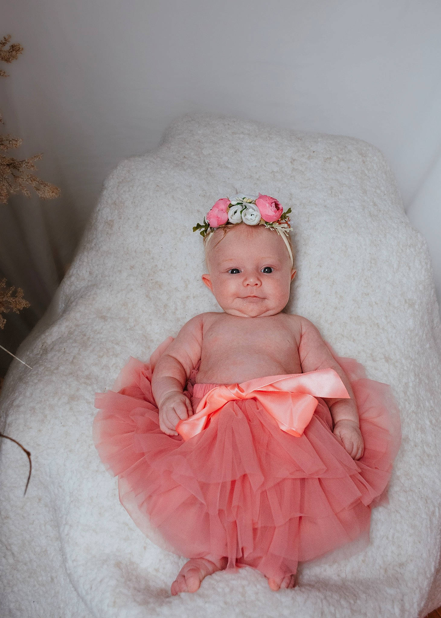 Char'Lee is registered to the contest to win money with this photo: baby, baby_toddler_clothing, bridal_accessory, comfort, dress, embellishment, flash_photography, hair_accessory, happy, headgear, headpiece, iris, linens, person, petal, pink, skin, sleeve, smile, textile
