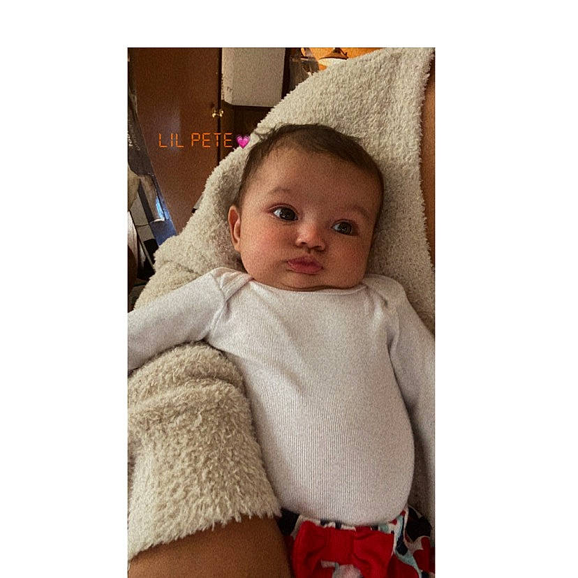 Kyra joined the competition — help win amazing prizes! baby, baby_products, baby_sleeping, baby_toddler_clothing, cap, comfort, eye, eyebrow, hair_accessory, happy, head, headgear, knit_cap, linens, outerwear, pattern, person, sleeve, toddler, wool