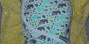 Sylas joined the competition — help win amazing prizes! baby, sleeping, swaddled, blanket, yellow, crochet, pacifier, elephant_pattern, infant, resting, cute, peaceful, child, soft, cozy, indoors, portrait, newborn, wrapped, face