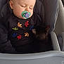 Rémy a rejoint le concours — aidez-le/la à gagner de superbes lots ! baby, pacifier, sleeping, high_chair, kitten, black_cat, child, indoor, cute, resting, toddler, clothing, sweater, furniture, pet, animal, face, head, peaceful, cozy