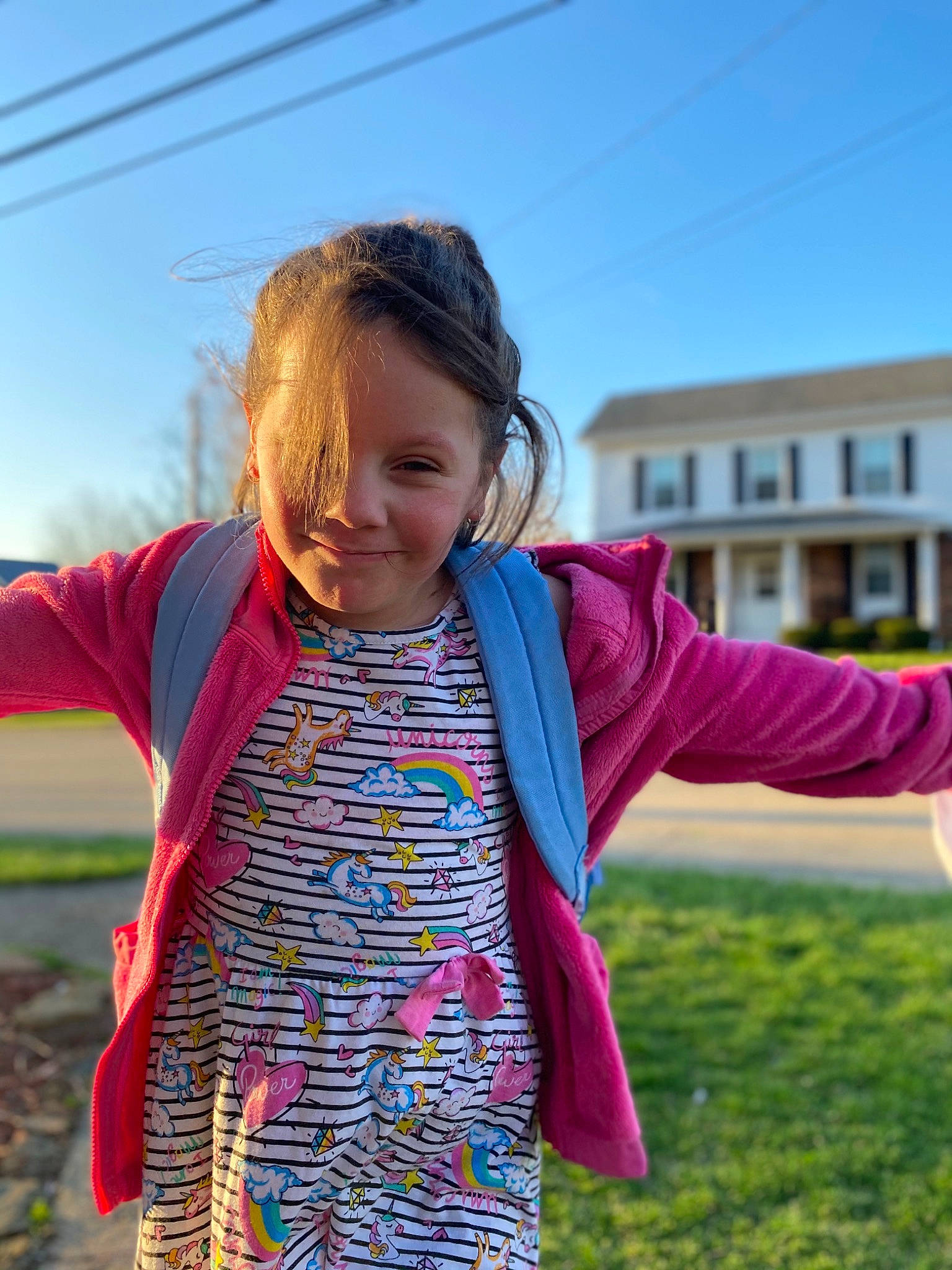 Lyndsey is registered to the contest to win money with this photo: blond, child, electric_blue, fun, gesture, grass, grassland, happy, joy, leisure, magenta, pattern, people_in_nature, person, plant, prairie, shoulder, sky, sleeve, smile