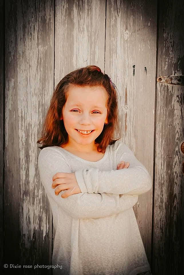 Lyndsey is registered to the contest to win money with this photo: blond, brown_hair, child, chin, eye, eyebrow, flash_photography, grass, happy, iris, joy, lip, long_hair, monochrome, monochrome_photography, people_in_nature, person, smile, tints_and_shades, toddler