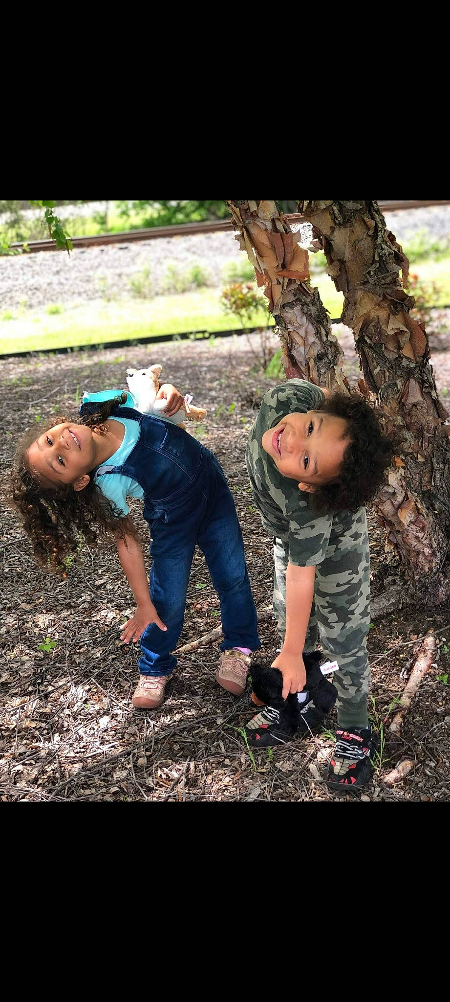 Bella Rose is registered to the contest to win money with this photo: adaptation, botany, branch, flash_photography, forest, fun, grass, happy, joy, leisure, natural_environment, organism, people_in_nature, person, plant, shoe, smile, sneakers, tree, trunk