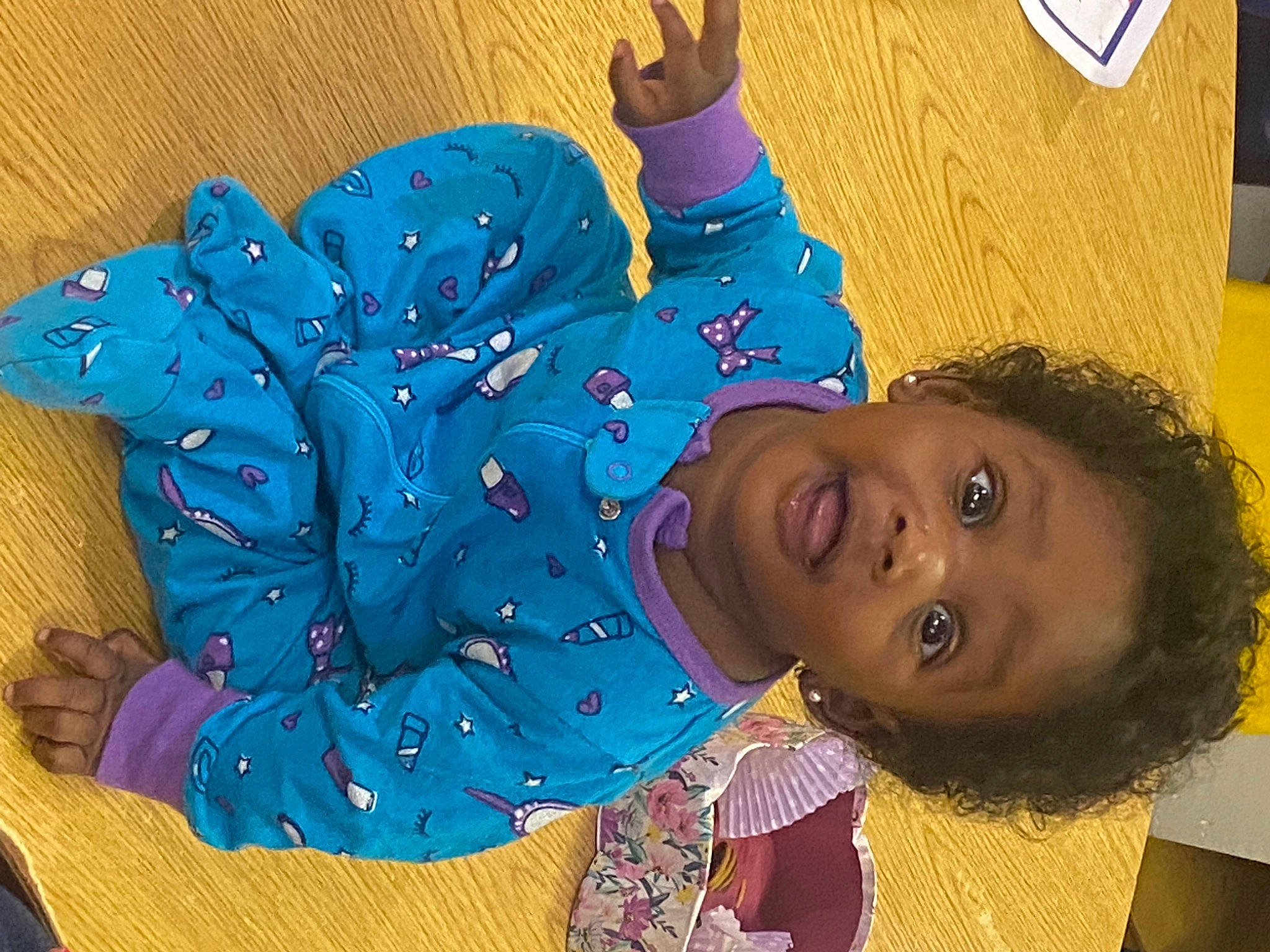 Zara joined the competition — help win amazing prizes! baby_toddler_clothing, black_hair, child, circle, electric_blue, fashion_accessory, fun, happy, leisure, magenta, neck, pattern, person, play, room, smile, surprise, toddler, visual_arts