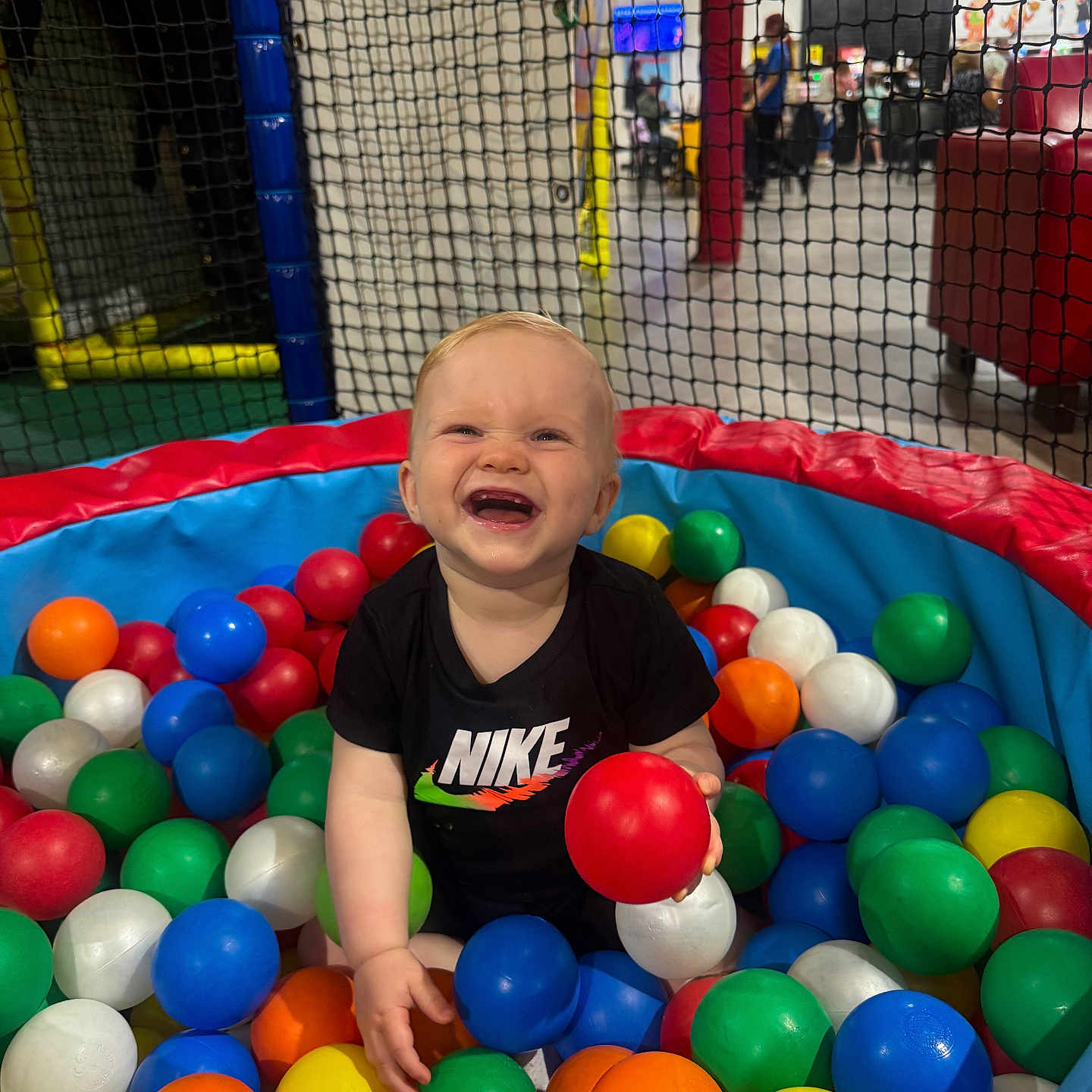 Dawson joined the competition — help win amazing prizes! ball_pit, black_tshirt, child, colorful_balls, cute, fun, happy, indoor_play_area, leisure, netting, nike_logo, person, plastic_balls, play, playground, recreation, smiling_child, toddler, toy, young_child