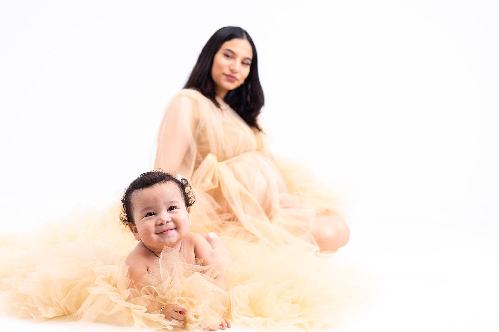 Damien is registered to the contest to win money with this photo: black_hair, blond, comfort, event, eye, flash_photography, foot, gesture, grass, hair, happy, head, human_body, joy, leisure, long_hair, people_in_nature, person, skin, smile