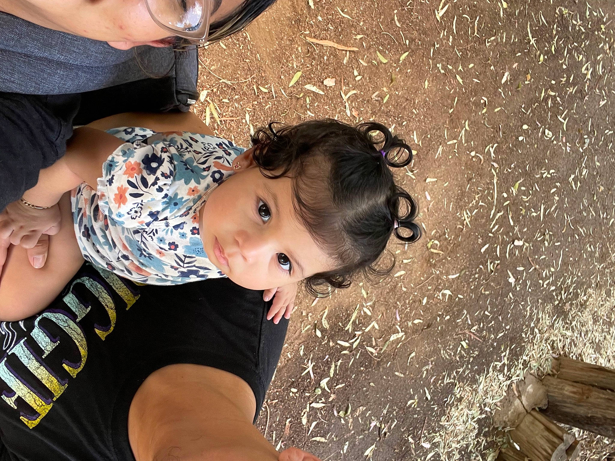 Dailyn is registered to the contest to win money with this photo: beauty, black_hair, child, cool, elbow, eyewear, flash_photography, fun, grass, hairstyle, happy, leisure, neck, person, sitting, skin, thigh, toddler, tree, trunk