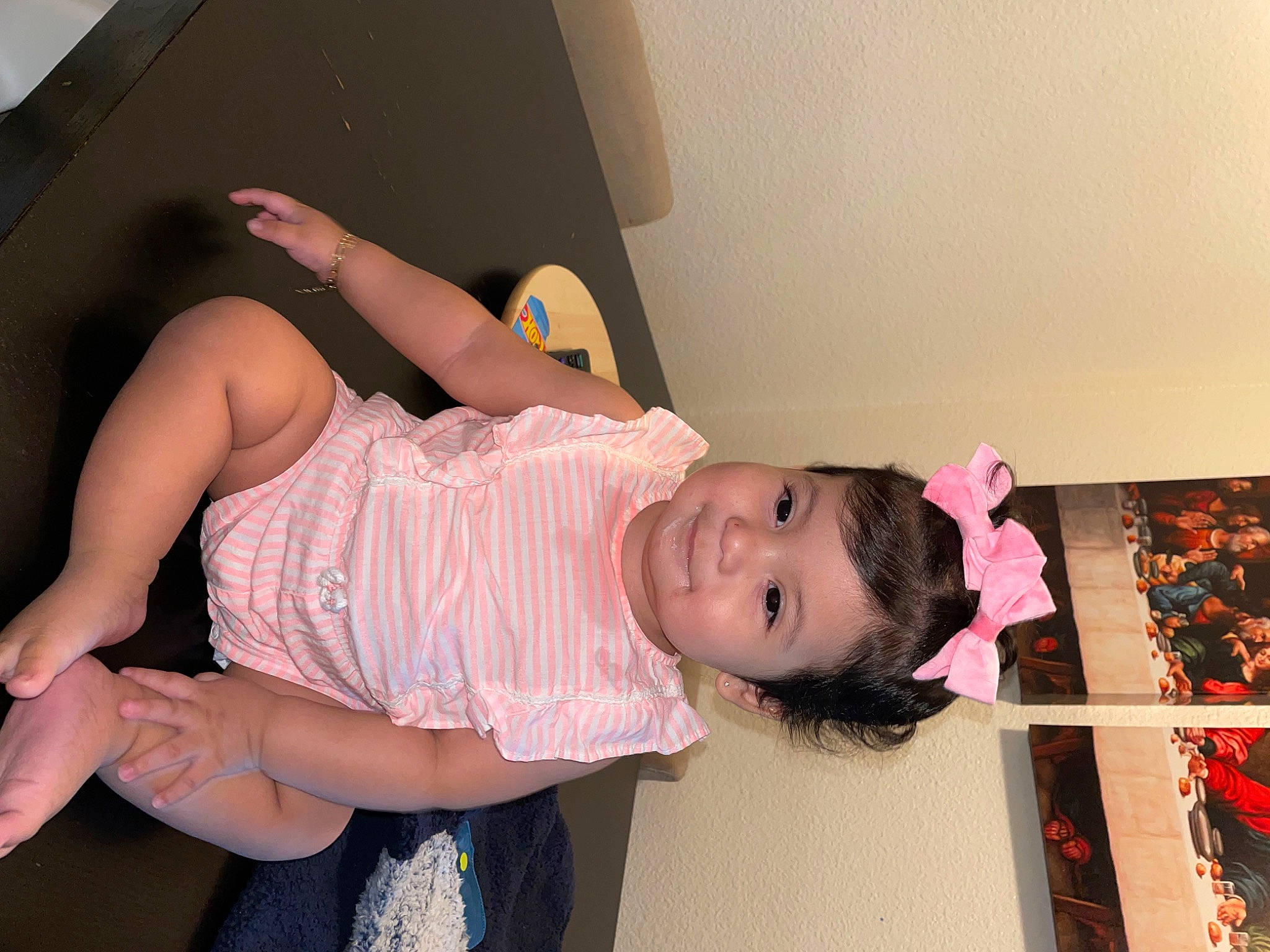 Dailyn is registered to the contest to win money with this photo: abdomen, baby_toddler_clothing, black_hair, child, comfort, elbow, event, eyelash, foot, fun, happy, human_leg, joy, knee, magenta, person, pink, room, skin, thigh
