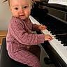 Ava joined the competition — help win amazing prizes! toddler, child, piano, keyboard, music, indoor, knitted_clothing, pink, hair_bow, bench, fingers, sheet_music, plant, wooden_furniture, portrait, cute, curious, baby, seat, cozy