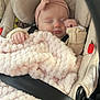 baby, beige, blanket, bundle, car_seat, child, clothing, cozy, cute, headband, indoor, infant, peaceful, pink, portrait, resting, seatbelt, sleeping, soft_texture, toddler