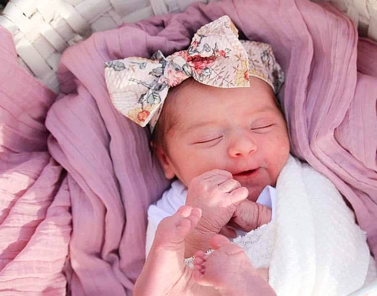 Raina is registered to the contest to win money with this photo: baby, baby_sleeping, baby_toddler_clothing, cheek, child, comfort, finger, hand, happy, headgear, headpiece, headwear, lip, mouth, person, pink, purple, skin, smile, textile