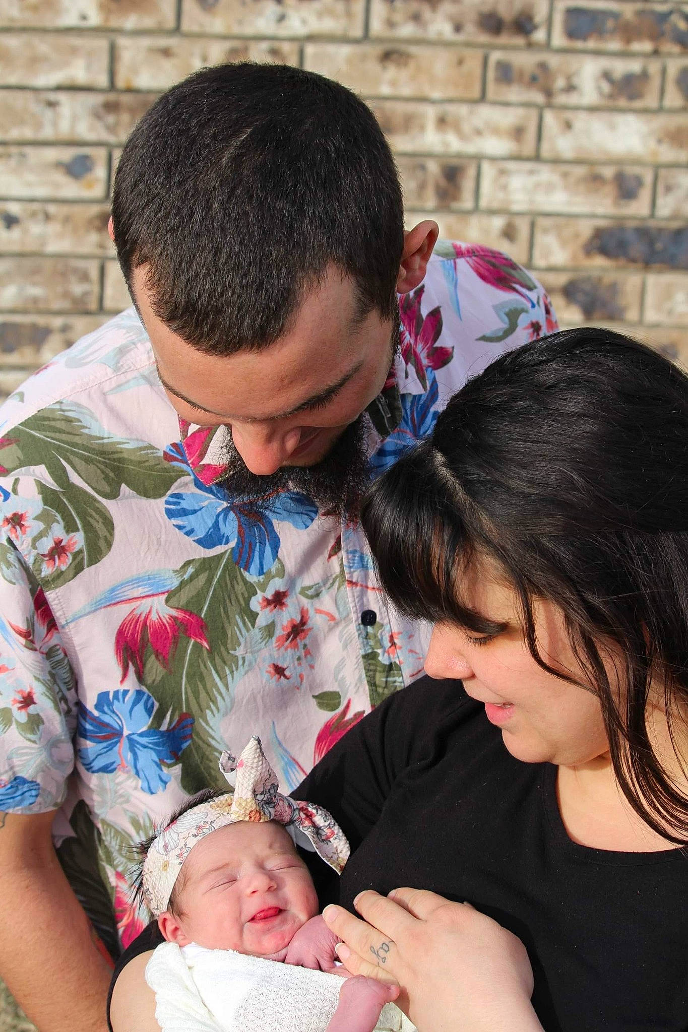 Raina is registered to the contest to win money with this photo: baby, baby_toddler_clothing, brick, child, clothing, event, face, grass, hairstyle, happy, headwear, lap, organ, people, person, photograph, sharing, sitting, skin, toddler