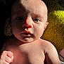 Weston joined the competition — help win amazing prizes! baby, blanket, child, closeup, cute, expression, face, fist, hand, human, indoors, infant, natural_light, newborn, person, portrait, shadow, skin, soft_texture, yellow