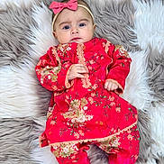 Zarnab joined the competition — help win amazing prizes! baby, infant, child, red_clothing, floral_pattern, headband, pink_bow, lying_down, soft_rug, gray_rug, white_rug, cute, portrait, indoors, fashion, adorable, small_hands, looking_at_camera, cozy, comfortable