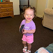 Raelynn is registered to the contest to win money with this photo: accessories, baseball, baseballglove, cabinet, child, clothing, drawer, face, female, footwear, furniture, girl, glove, head, person, photography, portrait, shoe, shorts, sport