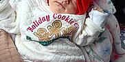 Tilly-Mae is registered to the contest to win money with this photo: baby, blanket, child, clothing, cozy, cute, cute_outfit, headband, holiday_sweater, holiday_theme, infant, portrait, red_bow, red_pants, relaxed, sleeping, soft_lighting, toddler, warm, white_sweater