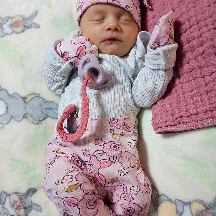 Tilly-Mae joined the competition — help win amazing prizes! adorable, baby, baby_clothes, blanket, cartoon_bunnies, cozy, cute, floral_pattern, hat, infant, lying_down, mittens, newborn, nursery, pacifier, peaceful, pink_clothing, resting, sleeping, soft_texture