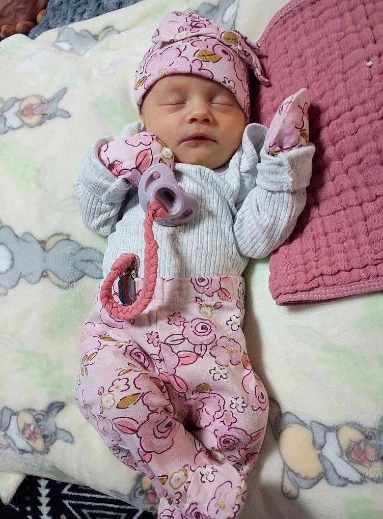 Tilly-Mae joined the competition — help win amazing prizes! newborn, baby, sleeping, pink_clothing, mittens, hat, pacifier, blanket, cartoon_bunnies, floral_pattern, infant, cozy, resting, cute, soft_texture, baby_clothes, lying_down, peaceful, adorable, nursery