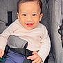 Ayaan is registered to the contest to win money with this photo: baby, smiling, child, stroller, seatbelt, clothing, happy, person, infant, cute, baby_toy, casual_wear, indoor, portrait, seat, hands, face, young_child, comfortable, bright