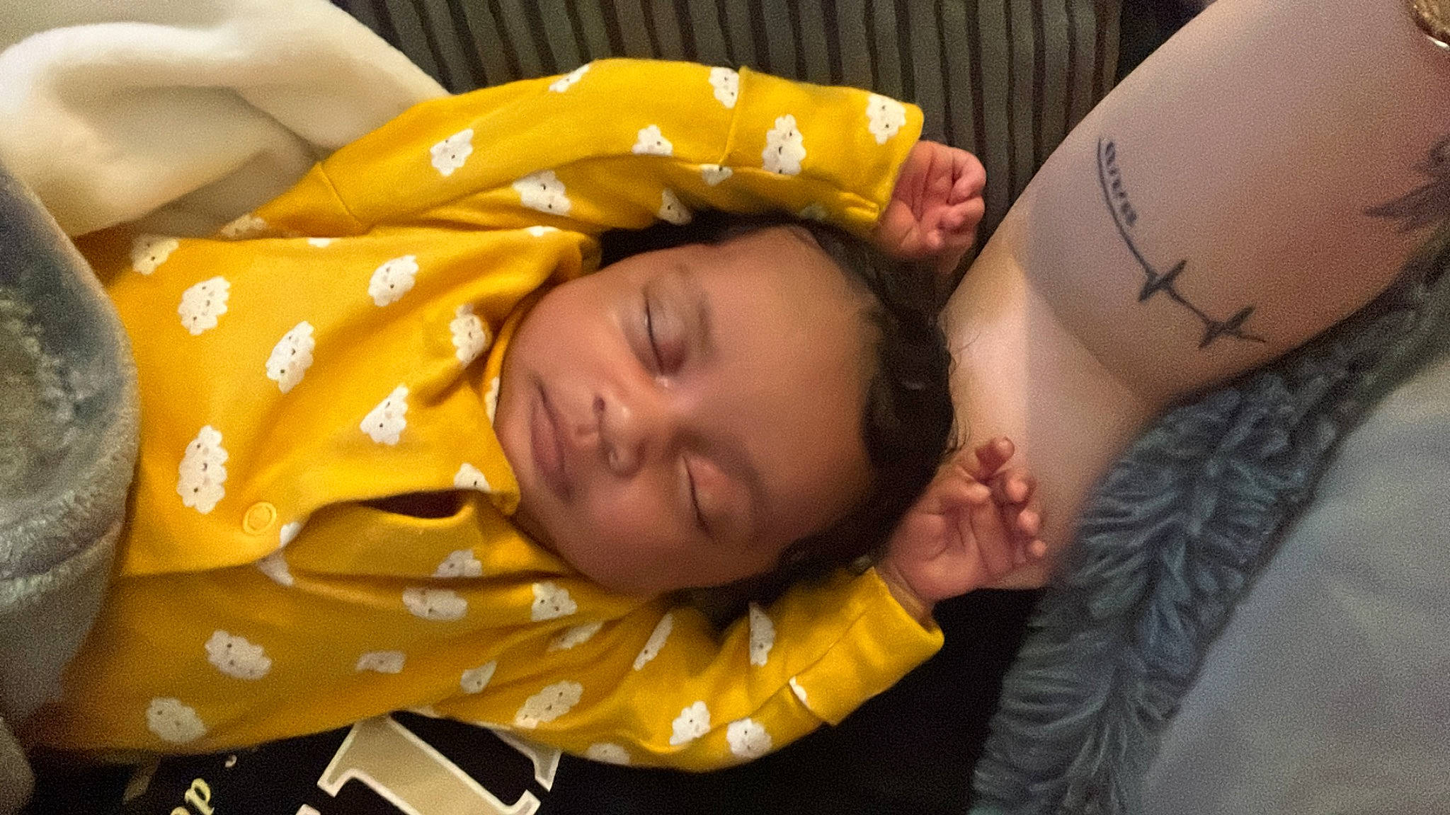 Ariah is registered to the contest to win money with this photo: abdomen, baby, chest, child, comfort, couch, elbow, eyelash, hand, happy, human_leg, jewellery, linens, pattern, person, skin, temporary_tattoo, thigh, toddler, trunk