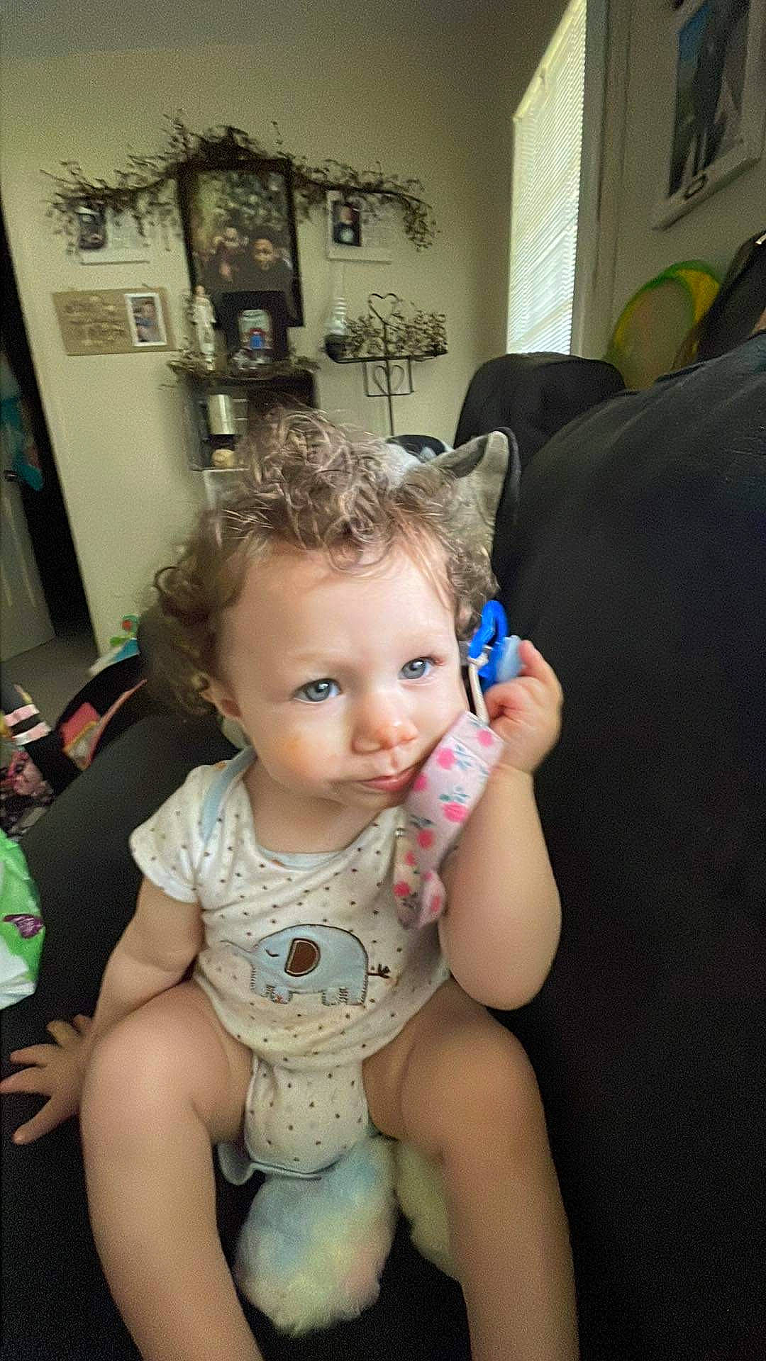 Layla joined the competition — help win amazing prizes! baby, baby_toddler_clothing, cheek, chest, child, couch, event, eye, flooring, foot, fun, happy, human_body, human_leg, iris, person, picture_frame, room, sitting, skin