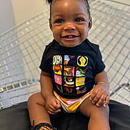 Laila joined the competition — help win amazing prizes! accessories, baby, babylaughing, bracelet, clothing, face, footwear, happy, head, jewelry, pants, person, photography, portrait, shoe, shorts, sitting, smile, sneaker, t_shirt